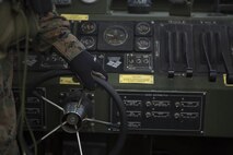Cpl. Austin Sprague, a combat engineer with Bridge Company, 9th Engineer Support Battalion, Combat Logistics Regiment 35, steers a Bridge Erection Boat at Naha Military Port, Okinawa, Japan Jan. 31, 2018. Marines with Bridge Co., 9th ESB conducted Improved Ribbon Bridge implementation training at the port, the first training of its kind to be conducted on salt water by Bridge Co. Sprague is a native of Martinsville, Indiana. (U.S. Marine Corps photo by Pfc. Jamin M. Powell)