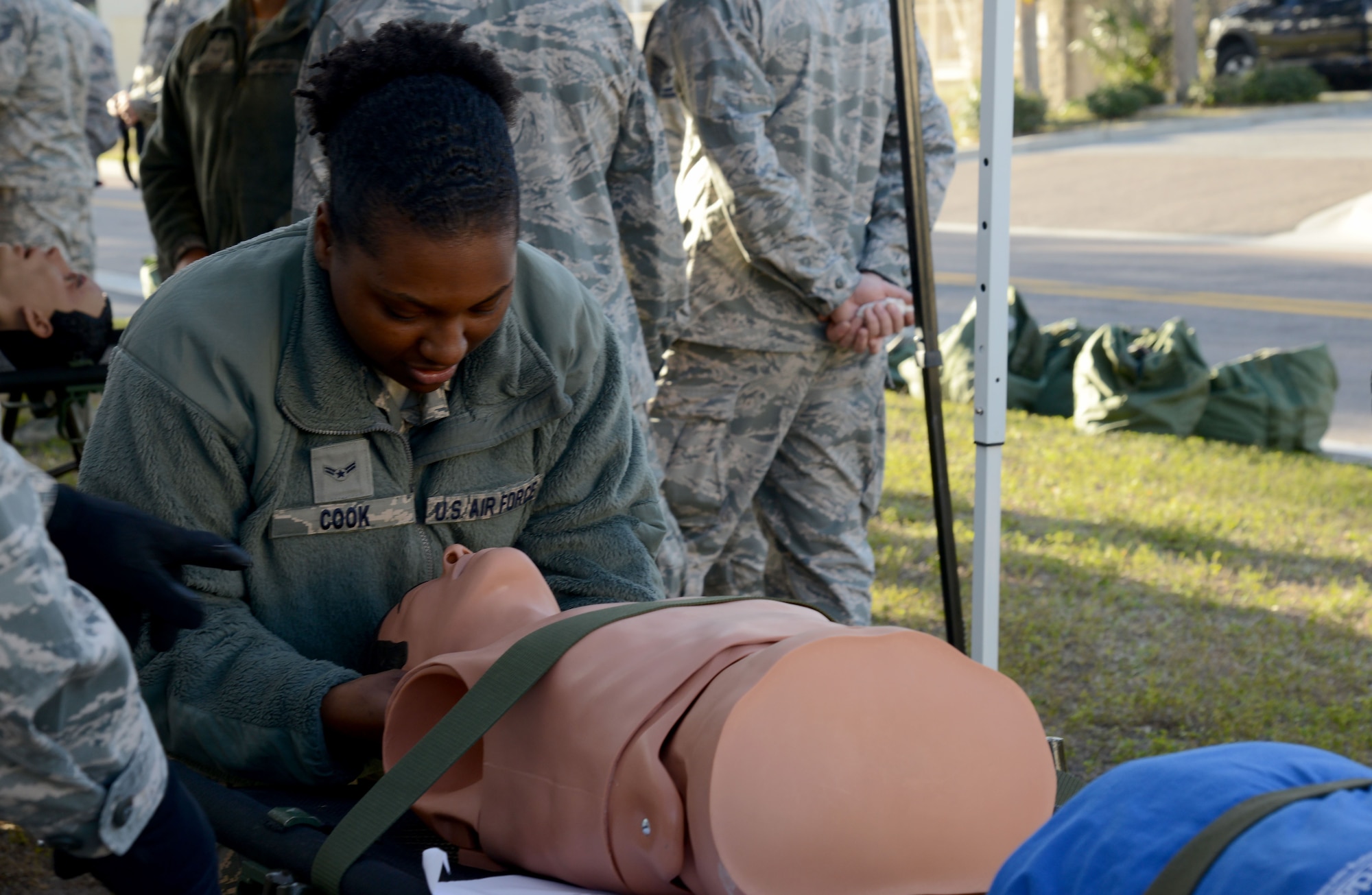 A U.S. Air Force Airman practices the jaw-thrust maneuver during Ability to Survive and Operate (ATSO) training at MacDill Air Force Base, Fla., Jan. 26, 2018.