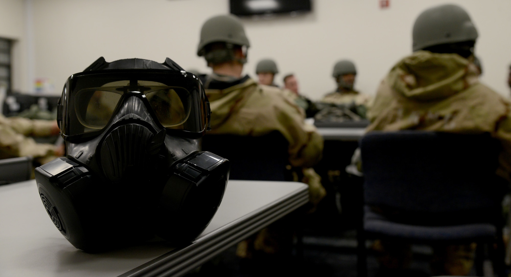 U.S. Air Force Airmen train on proper wear of mission oriented protective posture (MOPP) gear during Ability to Survive and Operate (ATSO) training at MacDill Air Force Base, Fla., Jan. 26, 2018.