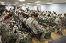 Airmen sitting in room