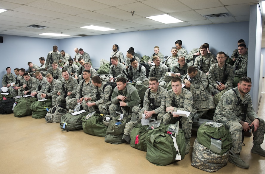 Airmen waiting to process deployment line
