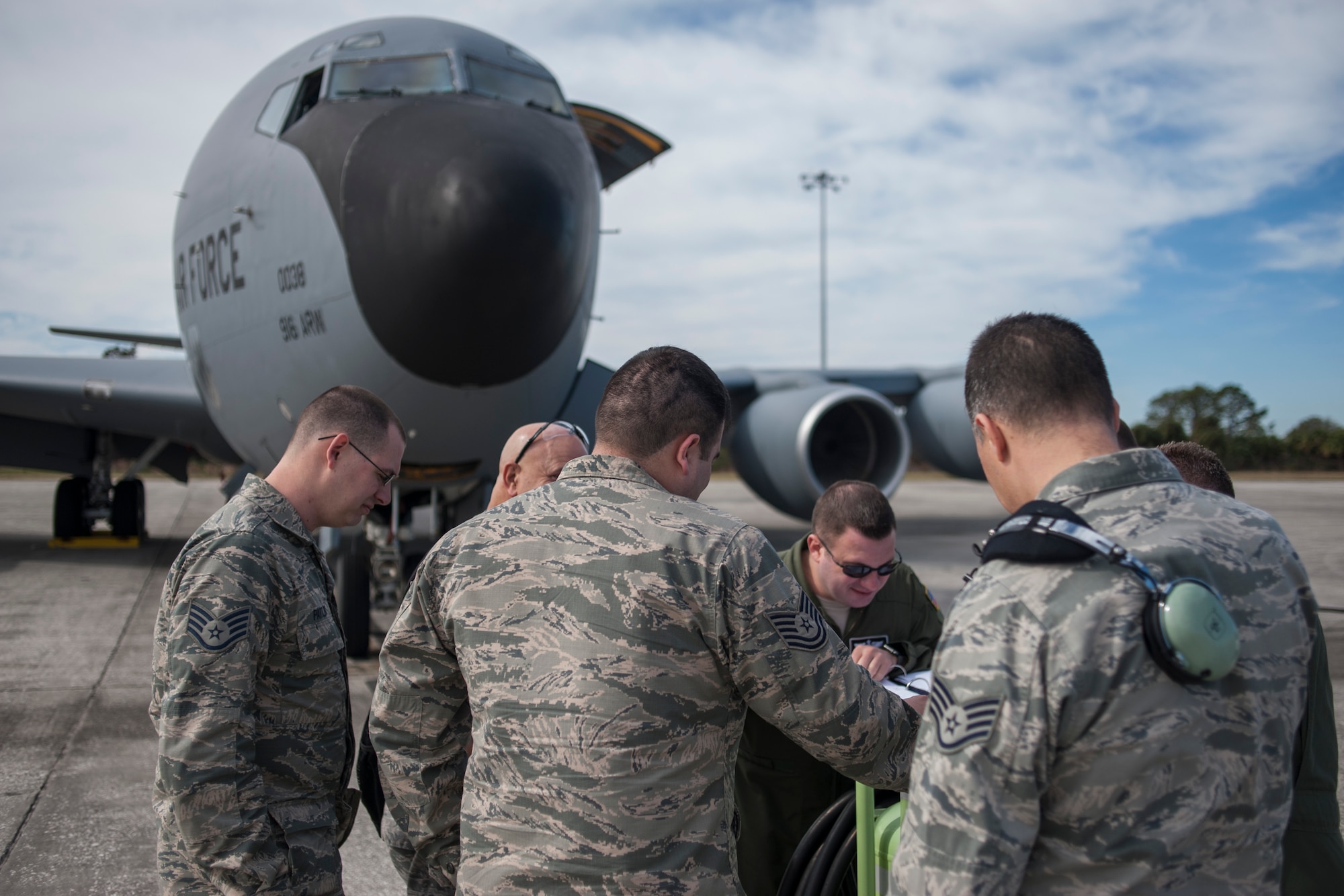 U.S. Air Force Airmen assigned to the 914th Air Refueling Wing (ARW) from Niagara Air Reserve Station, N.Y., review a mission brief prior to a refueling flight at MacDill Air Force Base, Fla., Jan. 30, 2018.