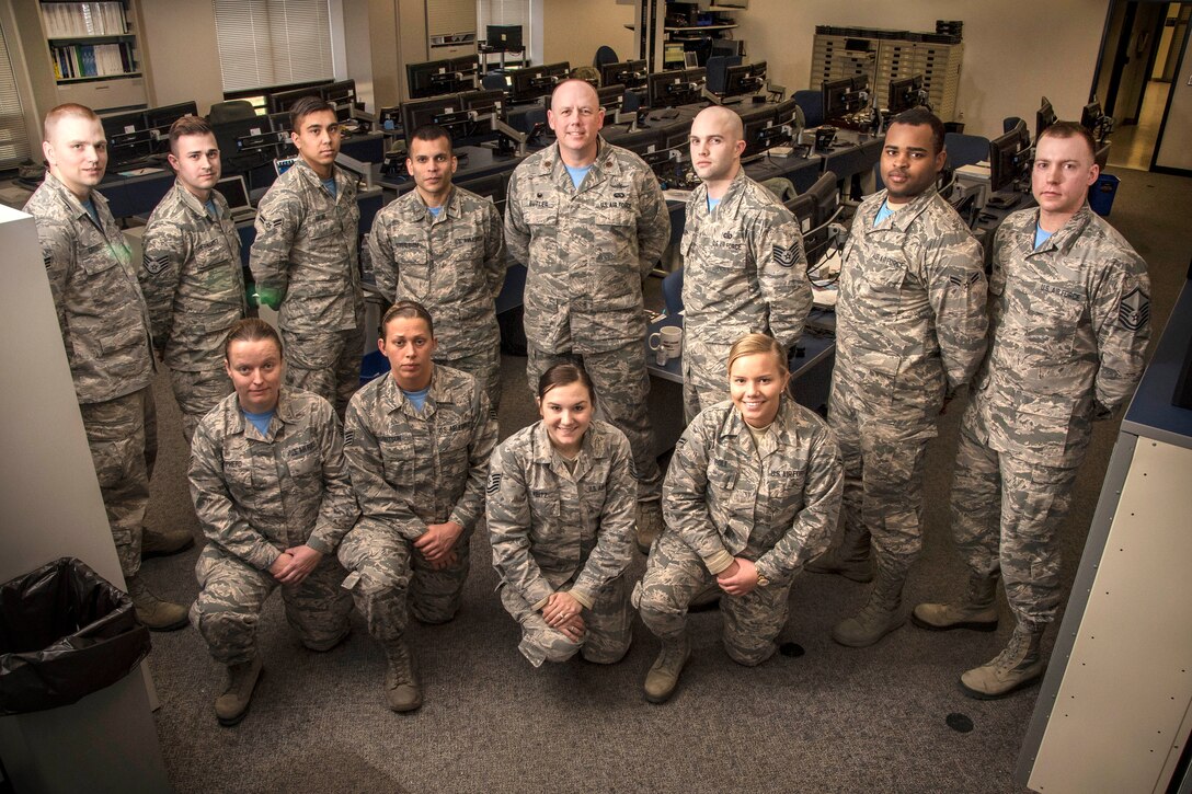 Airmen pose for a group photograph.
