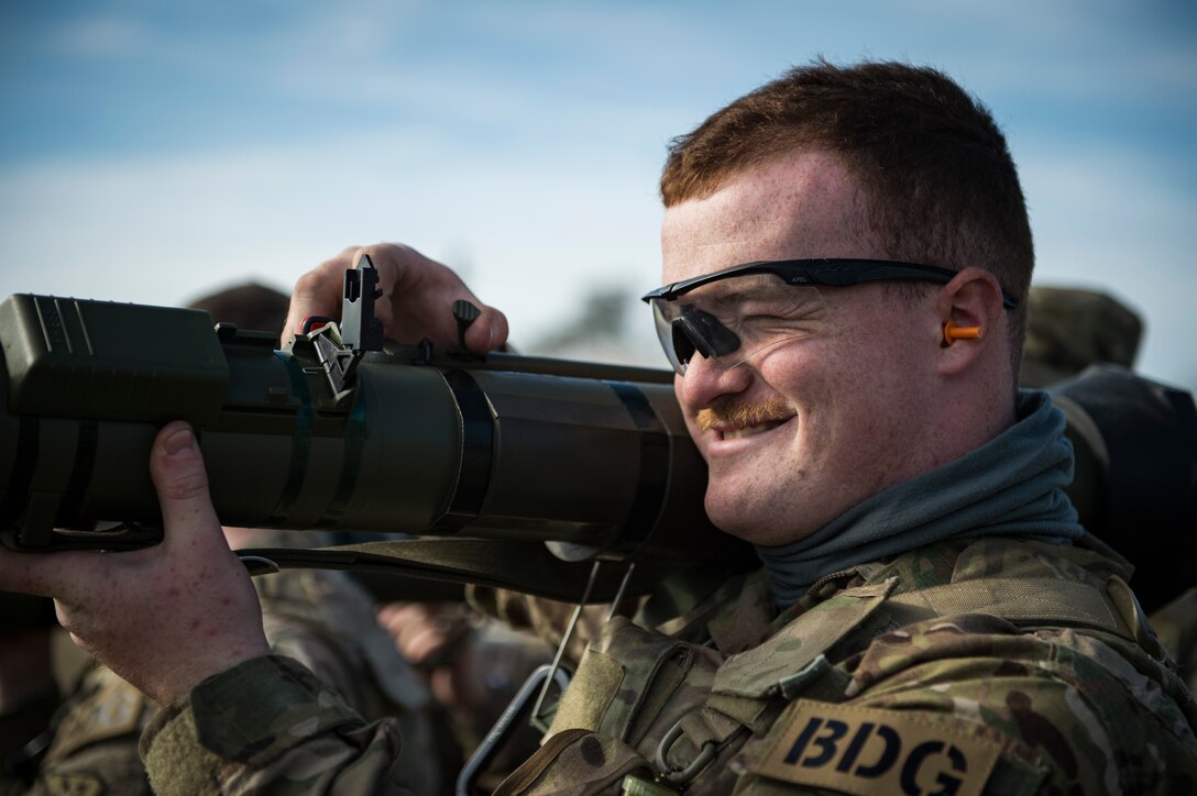 Airman 1st Class Devin Brown, 824th Base Defense Squadron fireteam member, practices the procedures to fire an M136E1 AT4-CS confined space light anti-armor weapon, Jan. 24, 2018, at Camp Blanding Joint Training Center, Fla. The Airmen traveled to Blanding to participate in Weapons Week where they qualified on heavy weapons ranging from the M249 light machine gun to the M18 Claymore mine. (U.S. Air Force photo by Senior Airman Janiqua P. Robinson)