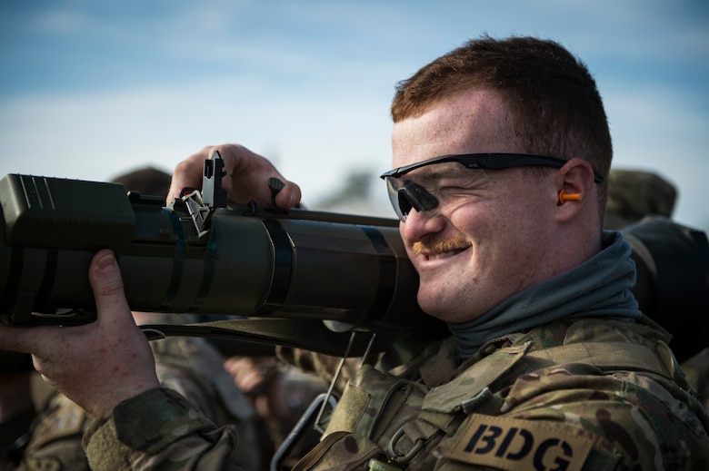 Airman 1st Class Devin Brown, 824th Base Defense Squadron fireteam member, practices the procedures to fire an M136E1 AT4-CS confined space light anti-armor weapon, Jan. 24, 2018, at Camp Blanding Joint Training Center, Fla. The Airmen traveled to Blanding to participate in Weapons Week where they qualified on heavy weapons ranging from the M249 light machine gun to the M18 Claymore mine. (U.S. Air Force photo by Senior Airman Janiqua P. Robinson)