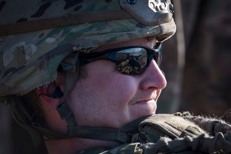 Senior Airman Dustin Hewett, 824th Base Defense Squadron fireteam member, grimaces while firing an M2 machine gun, Jan. 24, 2018, at Camp Blanding Joint Training Center, Fla. The Airmen traveled to Blanding to participate in Weapons Week where they qualified on heavy weapons ranging from the M249 light machine gun to the M18 Claymore mine. (U.S. Air Force photo by Senior Airman Janiqua P. Robinson)