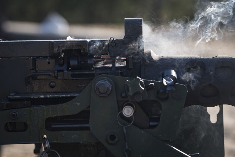 A .50 caliber round travels through an M2 machine gun, Jan. 23, 2018, at Camp Blanding Joint Training Center, Fla. The Airmen traveled to Blanding to participate in Weapons Week where they qualified on heavy weapons ranging from the M249 light machine gun to the M18 Claymore mine. (U.S. Air Force photo by Senior Airman Janiqua P. Robinson)