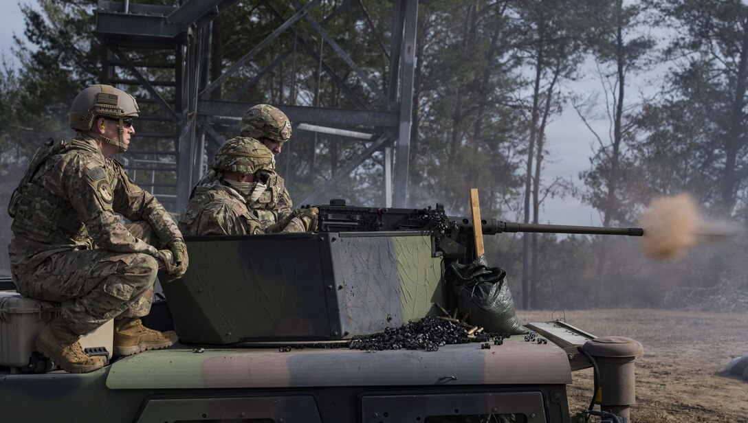 An Airman from the 824th Base Defense Squadron fires an M2 machine gun, Jan. 23, 2018, at Camp Blanding Joint Training Center, Fla.The Airmen traveled to Blanding to participate in Weapons Week where they qualified on heavy weapons ranging from the M249 light machine gun to the M18 Claymore mine. (U.S. Air Force photo by Senior Airman Janiqua P. Robinson)