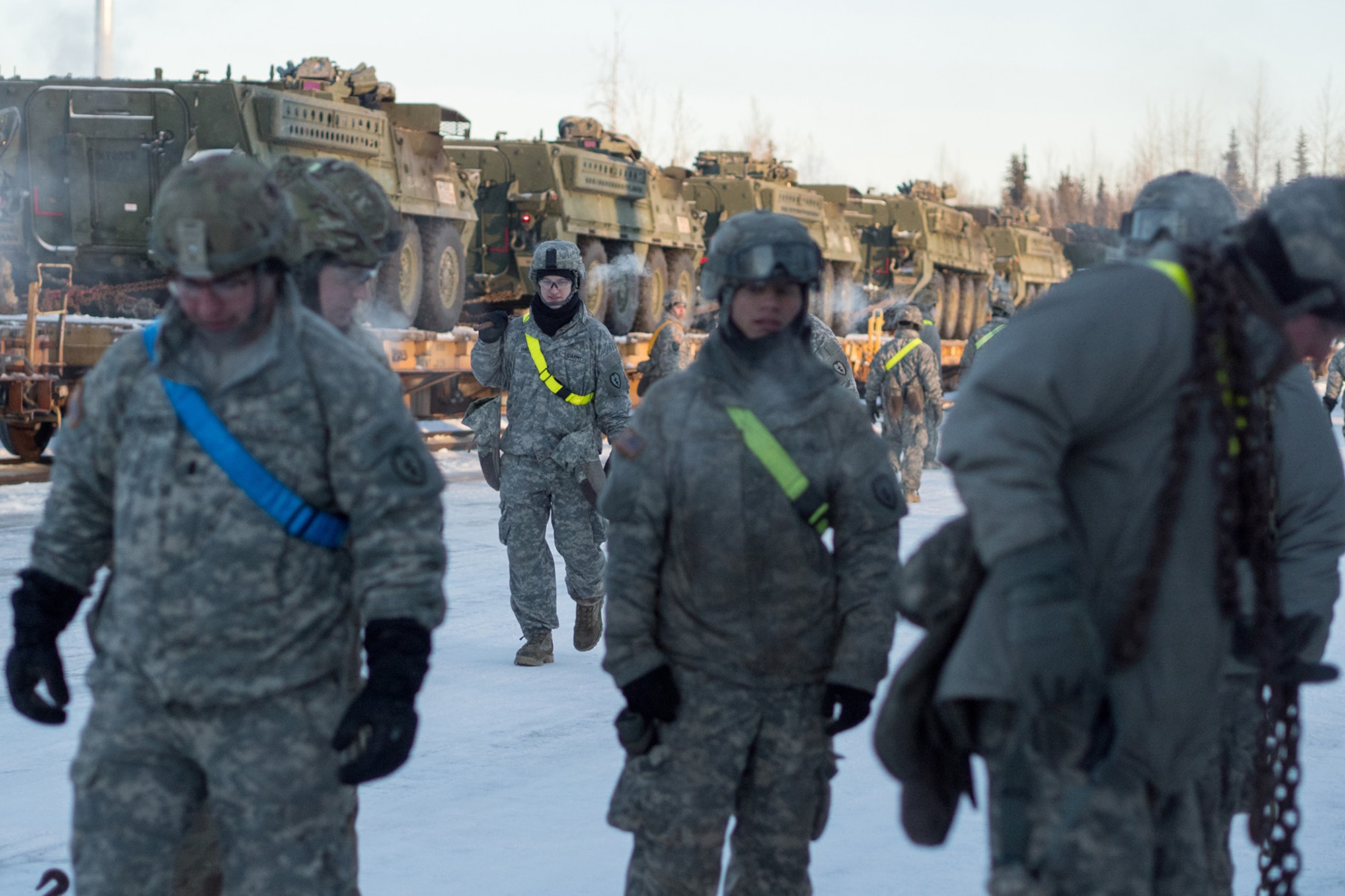 Soldiers assigned to the 1st Stryker Brigade Combat Team, 25th Infantry Division, U.S. Army Alaska, perform railhead operations in sub-zero temperatures on Joint Base Elmendorf-Richardson, Alaska, Jan. 30, 2018.  The Fort Wainwright-based Soldiers are off-loading their vehicles and equipment as part of Arctic Thrust, a short-notice rapid deployment exercise.