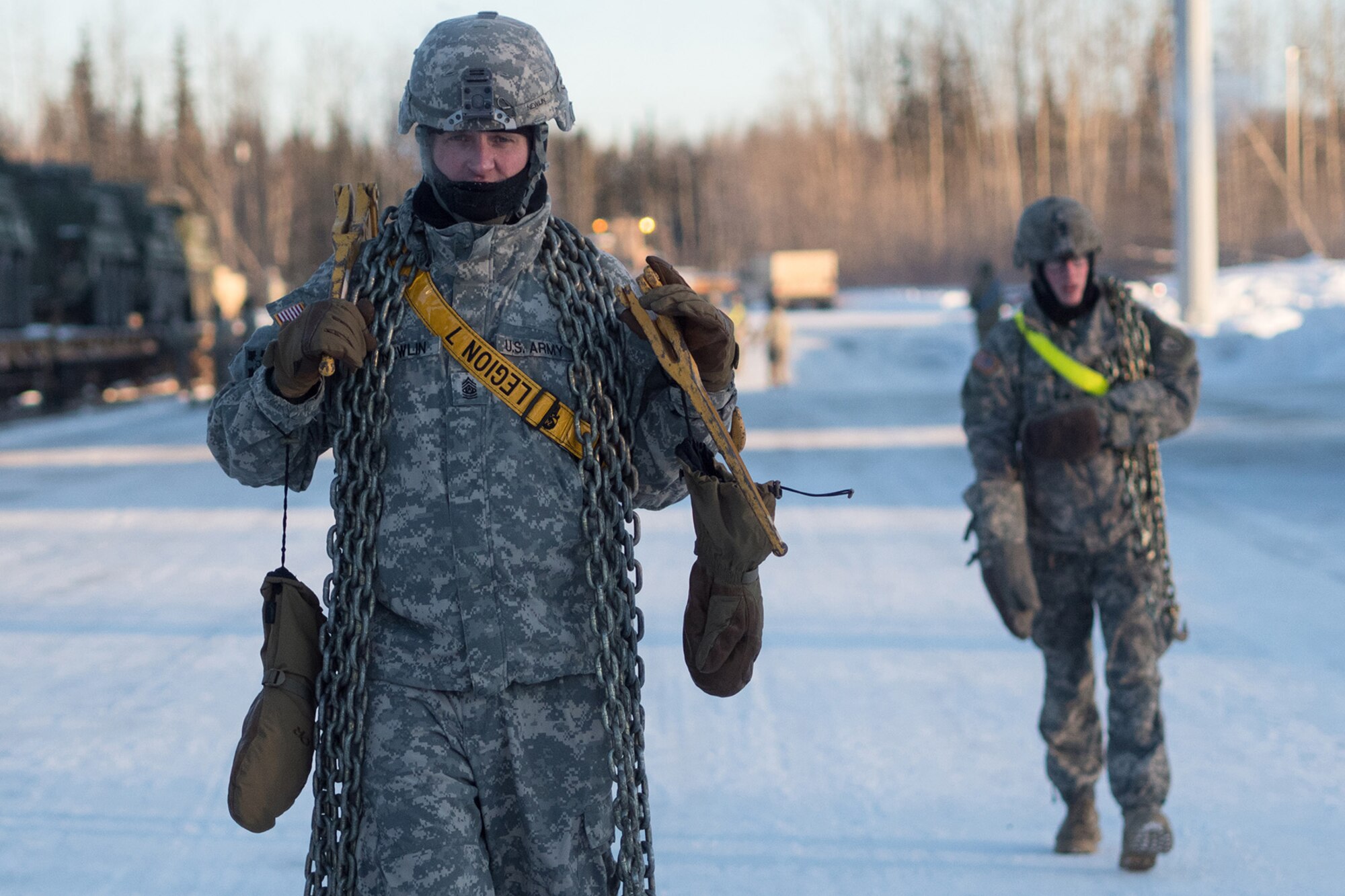 Soldiers assigned to the 1st Stryker Brigade Combat Team, 25th Infantry Division, U.S. Army Alaska, perform railhead operations in sub-zero temperatures on Joint Base Elmendorf-Richardson, Alaska, Jan. 30, 2018.  The Fort Wainwright-based Soldiers are off-loading their vehicles and equipment as part of Arctic Thrust, a short-notice rapid deployment exercise.