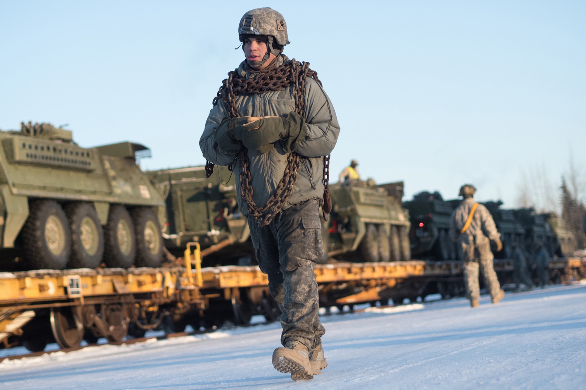 Soldiers assigned to the 1st Stryker Brigade Combat Team, 25th Infantry Division, U.S. Army Alaska, perform railhead operations in sub-zero temperatures on Joint Base Elmendorf-Richardson, Alaska, Jan. 30, 2018.  The Fort Wainwright-based Soldiers are off-loading their vehicles and equipment as part of Arctic Thrust, a short-notice rapid deployment exercise.