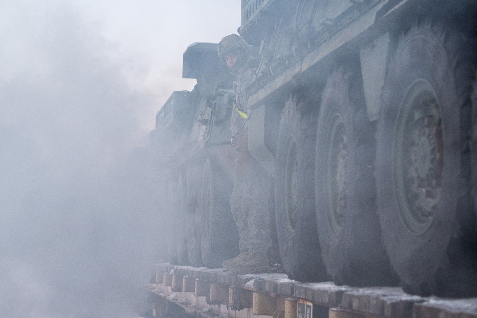 Soldiers assigned to the 1st Stryker Brigade Combat Team, 25th Infantry Division, U.S. Army Alaska, perform railhead operations in sub-zero temperatures on Joint Base Elmendorf-Richardson, Alaska, Jan. 30, 2018.  The Fort Wainwright-based Soldiers are off-loading their vehicles and equipment as part of Arctic Thrust, a short-notice rapid deployment exercise.