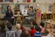 Jessica Puffenbarger, left, and Airman 1st Class Shinique Manders, both 23d Aerospace Medicine Squadron dental assistants, teach children from the child development center about various dental tools, Feb. 1, 2018, at Moody Air Force Base, Ga. Airmen from the 23d AMDS visited the Child Development Center as part of National Children’s Dental Health Month, to teach children the importance of proper oral care and good habits for taking care of their teeth. (U.S. Air Force photo by Senior Airman Lauren M. Sprunk)