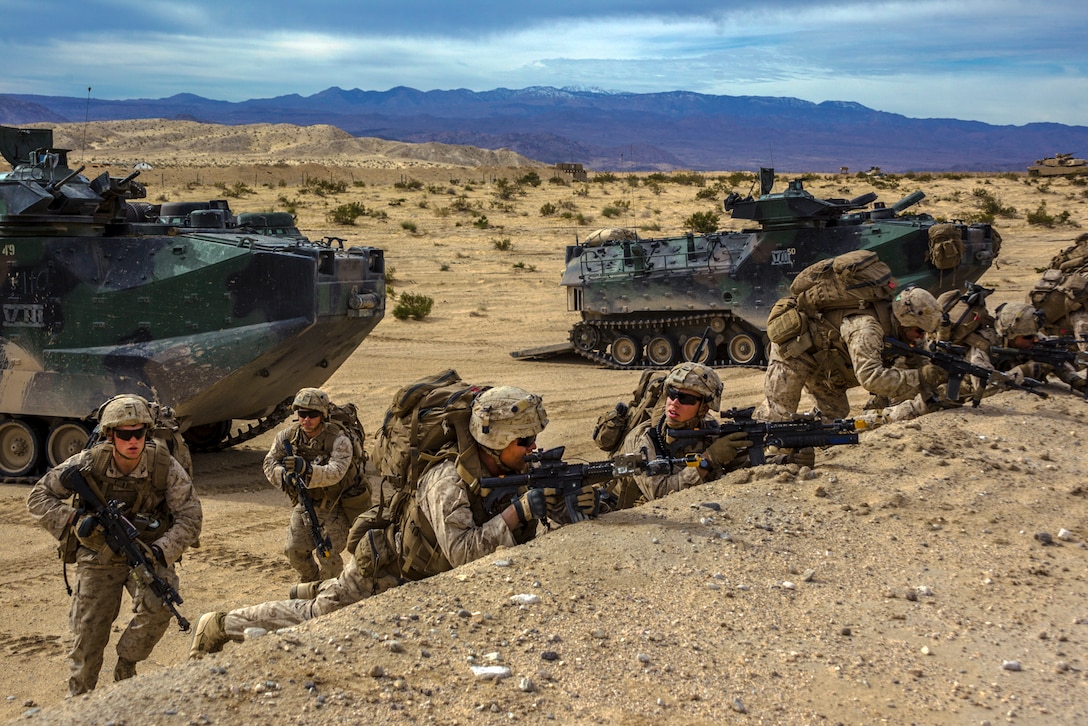 Marines practice assault skills on a range during an exercise in California.