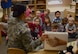 Airman 1st Class Shinique Manders, 23d Areospace Medicine Squadron dental assistant, teaches children which food and drinks are good or bad for their teeth, Feb. 1, 2018, at Moody Air Force Base, Ga. Dental assistants from the 23d Aerospace Medical Squadron visited the Child Development Center as part of National Children’s Dental Health Month, to teach children the importance of proper oral care and good habits for taking care of their teeth. (U.S. Air Force photo by Senior Airman Lauren M. Sprunk)