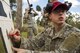 Staff Sgt. Shelby Bibb, Joint Base Security combat arms instructor, gives sighting corrections to Airmen who are qualifying at the combat arms training and maintenance range at Scofield Barracks, Hawaii, Jan. 30, 2019. At the range, Airmen familiarize themselves with the weapons they use while deployed. (U.S. Air Force photo by Tech. Sgt. Heather Redman)