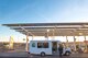 A bus from the 56th Force Support Squadron Outdoor Recreation facility stops for gas in Camp Verde, Ariz., Jan. 27, 2018. Outdoor Recreation hosted a trip to Grand Canyon National Park for 12 military affiliated Thunderbolts. (U.S. Air Force photo/Airman 1st Class Caleb Worpel)