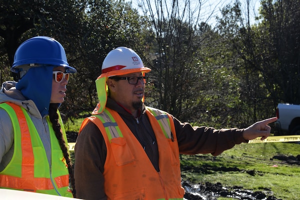 Quality Assurance Specialist Mary DeVries discusses debris removal operations in Napa County, CA, with USACE Quality Assurance Supervisor Richard Aguirre. Members from the Bureau of Reclamation are augmenting the USACE quality assurance mission during recovery from devastating wildfires which began in October 2017.