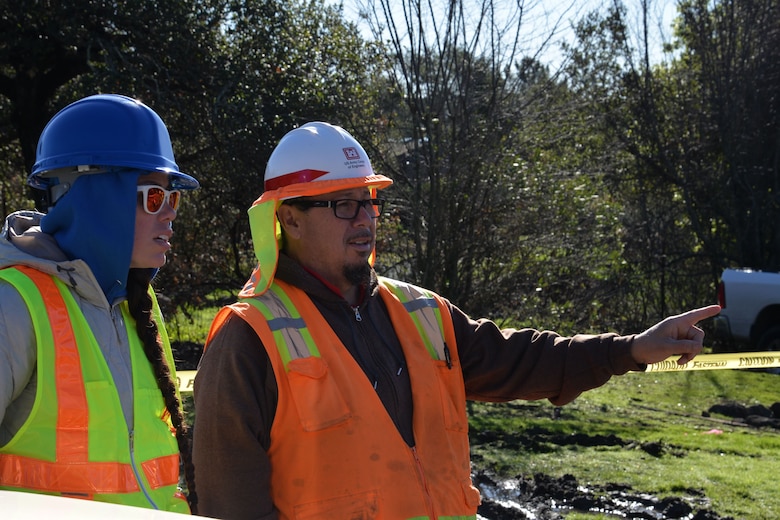 Quality Assurance Specialist Mary DeVries discusses debris removal operations in Napa County, CA, with USACE Quality Assurance Supervisor Richard Aguirre. Members from the Bureau of Reclamation are augmenting the USACE quality assurance mission during recovery from devastating wildfires which began in October 2017.