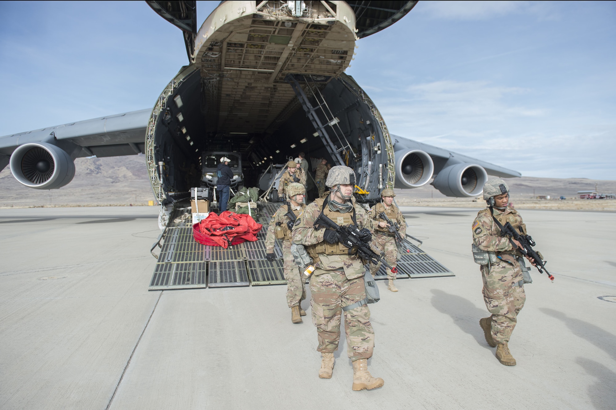 Airmen assigned to the 821st Contingency Response Group deployed to Amedee Army Airfield, Calif., as part of a week-long readiness exercise, Jan. 31, 2018.  The exercise evaluated the Airmen’s readiness and ability to execute and sustain rapid global mobility around the world. (U.S. Air Force photo by Tech. Sgt. Liliana Moreno/Released)