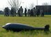 U.S. Airmen assigned to the 100th Air Refueling Wing conduct a post attack reconnaissance sweep during a chemical, biological, radiological and nuclear defense survival skills class at RAF Mildenhall, England, Jan. 30, 2018. During a PAR sweep, Airmen perform searches around their facilities looking for unexploded ordnance and evidence of chemical agents. (U.S. Air Force photo by Senior Airman Alexandra West)