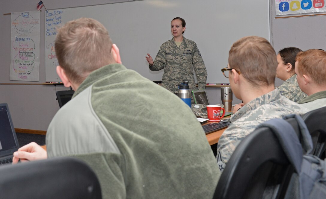 Tech. Sgt. Abigail Philbrick, a Professional Military Education instructor assigned to the 28th Force Support Squadron, explains the difference of professional and unprofessional qualities in supervisors inside the Samuel O. Turner Airman Leadership School building at Ellsworth Air Force Base, S.D., Jan. 16, 2018. ALS is a month-long PME course devoted to building the foundation of supervisory skills necessary to be a noncommissioned officer. (U.S. Air Force photo by Airman 1st Class Nicolas Z. Erwin)