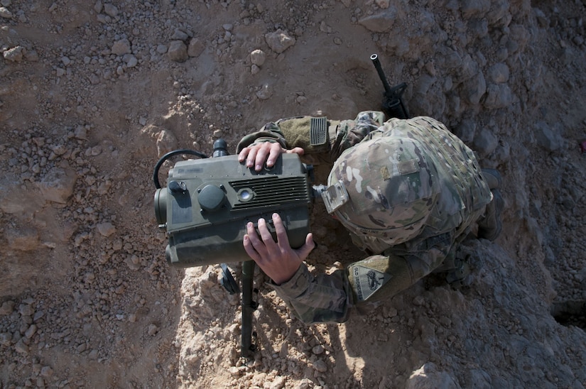Corporal Justin Collins, a forward observer with C Company, 1st Battalion, 37th Armored Regiment, 2nd Armored Brigade Combat Team, 1st Infantry Division, scans for enemy forces with a lightweight laser designator rangefinder, Jan 29. 2018, during Inferno Creek 2018 near Thumrait, Oman. Inferno Creek 2018 is an annual Omani-U.S. exercise focused on building bilateral ties between the two militaries. This is the first time the exercise was held at the company level.