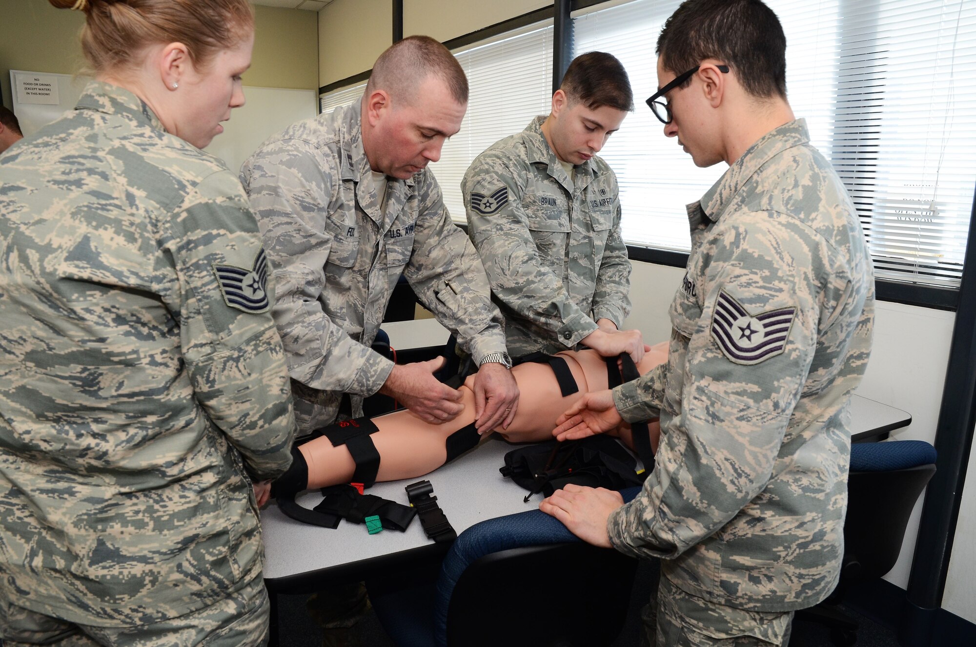 U.S. Air Force Capt. Scott Fox, Prehospital Trauma Life Support (PHLS) Instructor with the Alabama Air National Guard, instructs medical technicians from the 157th Medical Group (MDG), New Hampshire and the 116 MDG, Georgia advanced airway management techniques during a training exercise at Nellis AFB, Las Vegas, Jan. 26 to Feb. 2, 2018. Fifteen of the 27 Chemical Biological Radiological Nuclear high-yield Explosive (CBRNE) Enhanced Response Force Packages (CERFP) joined together to sharpen their skills. (Georgia Air National Guard Photo by Tech. Sgt. Keri Giles)