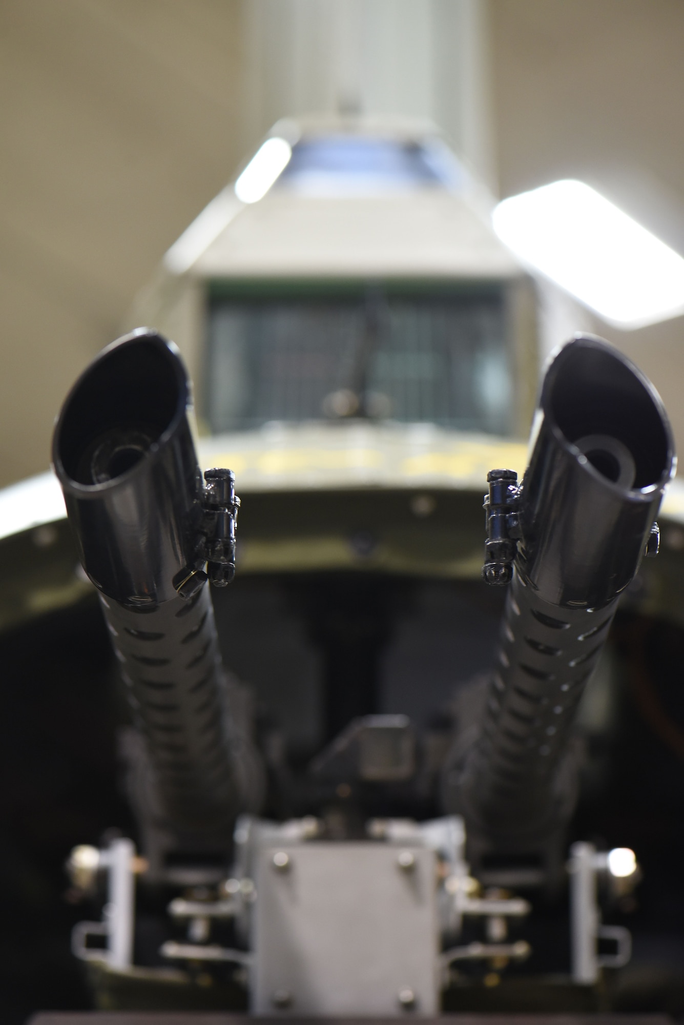 (02/01/2018) A view of the Boeing B-17F Memphis Belle tail gun position in the museum's restoration hangar. SSgt. John Quinlan the tail gunner of the Memphis Belle crew named the guns Pete and Repeat during WWII. Museum restoration specialist Casey Simmons repainted the names on the tail. (U.S. Air Force photo by Ken LaRock)