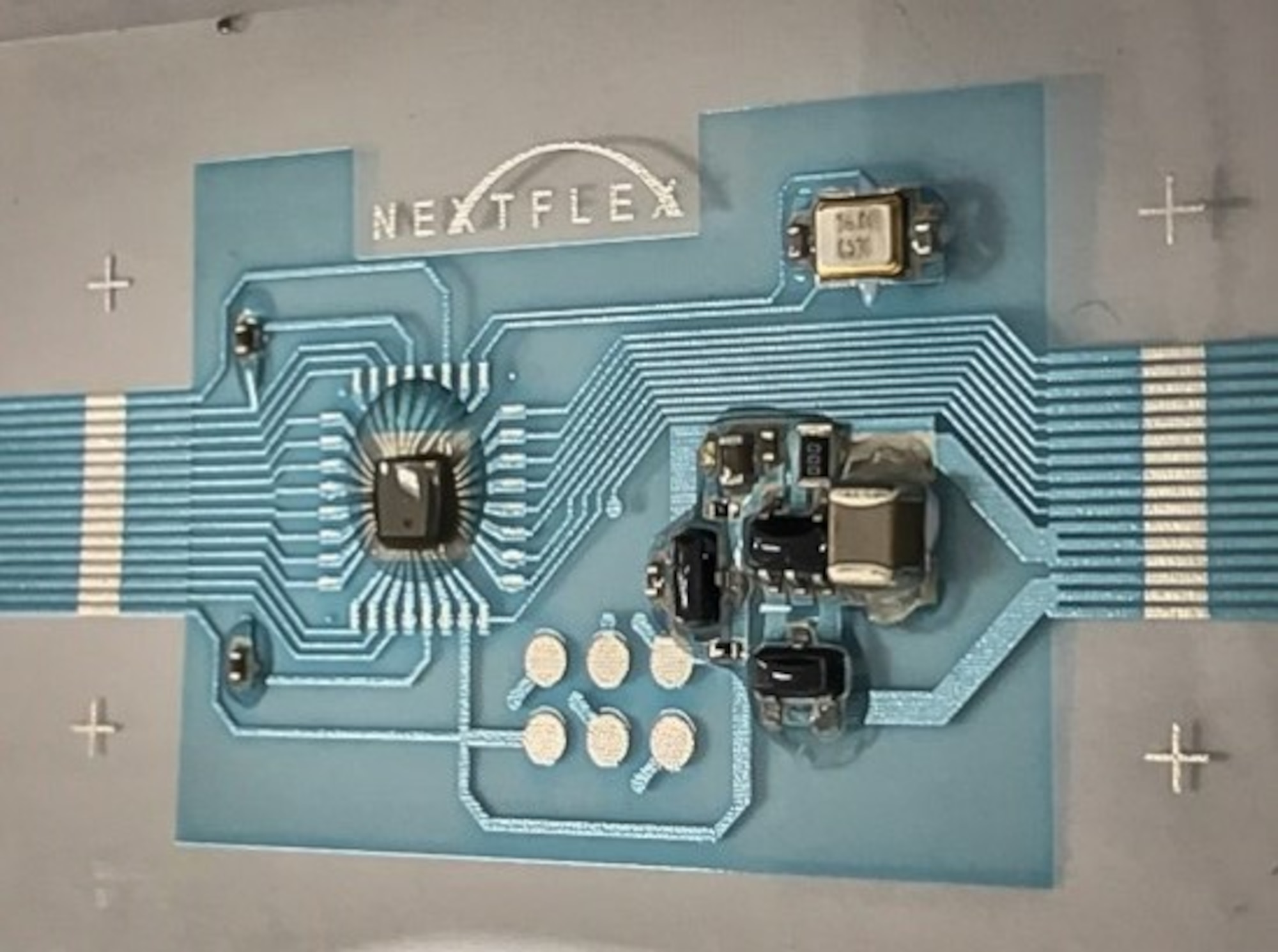 Flexible hybrid electronics manufactured Arduino circuit