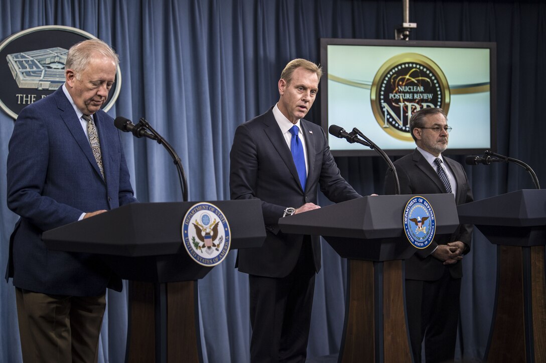 Deputy Defense Secretary Patrick M. Shanahan and two government officials brief reporters at the Pentaon.