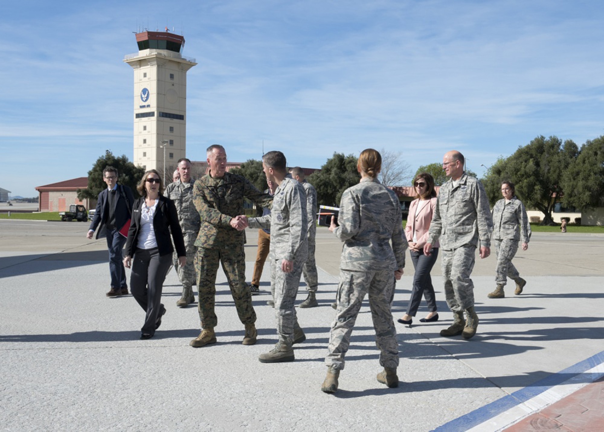 Leadership from Travis Air Force Base, Calif., welcome the Chairman of the Joint Chiefs of Staff Marine Corp Gen. Joe Dunford, Feb. 1, 2018, during a gas and go. (U.S. Air Force Photo by Lan Kim)