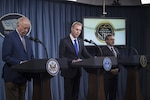 Deputy Defense Secretary Patrick M. Shanahan, center, Undersecretary of State for Political Affairs Thomas A. Shannon Jr., left, and Deputy Energy Secretary Dan Brouillette brief the press on the 2018 Nuclear Posture Review at the Pentagon.