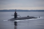 A submarine travels in water.