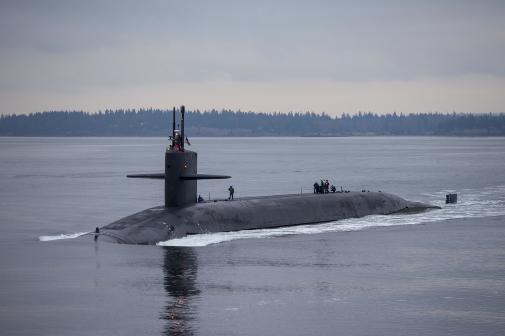 A submarine travels in water.