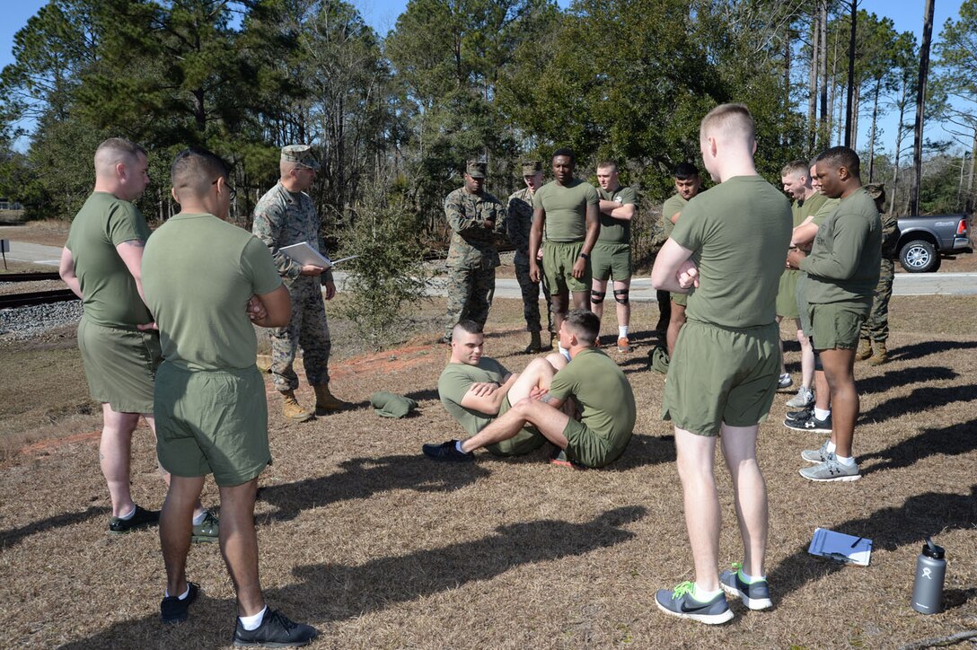 Marines participate in a mock Physical Fitness Test