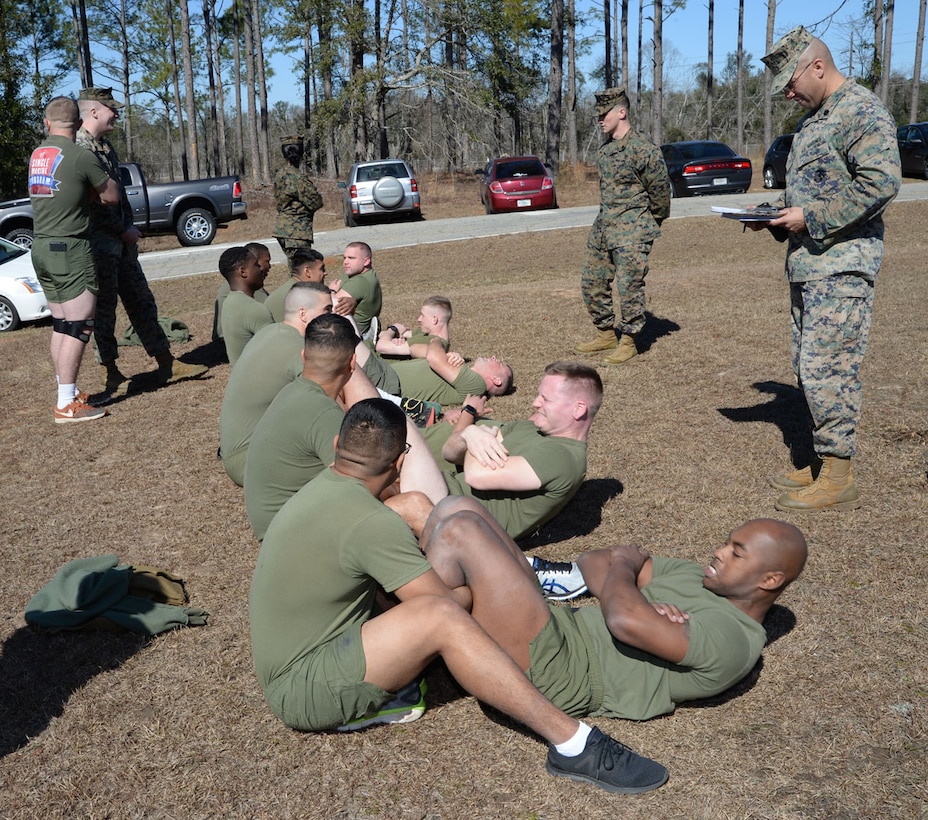 Marines participate in a mock Physical Fitness Test