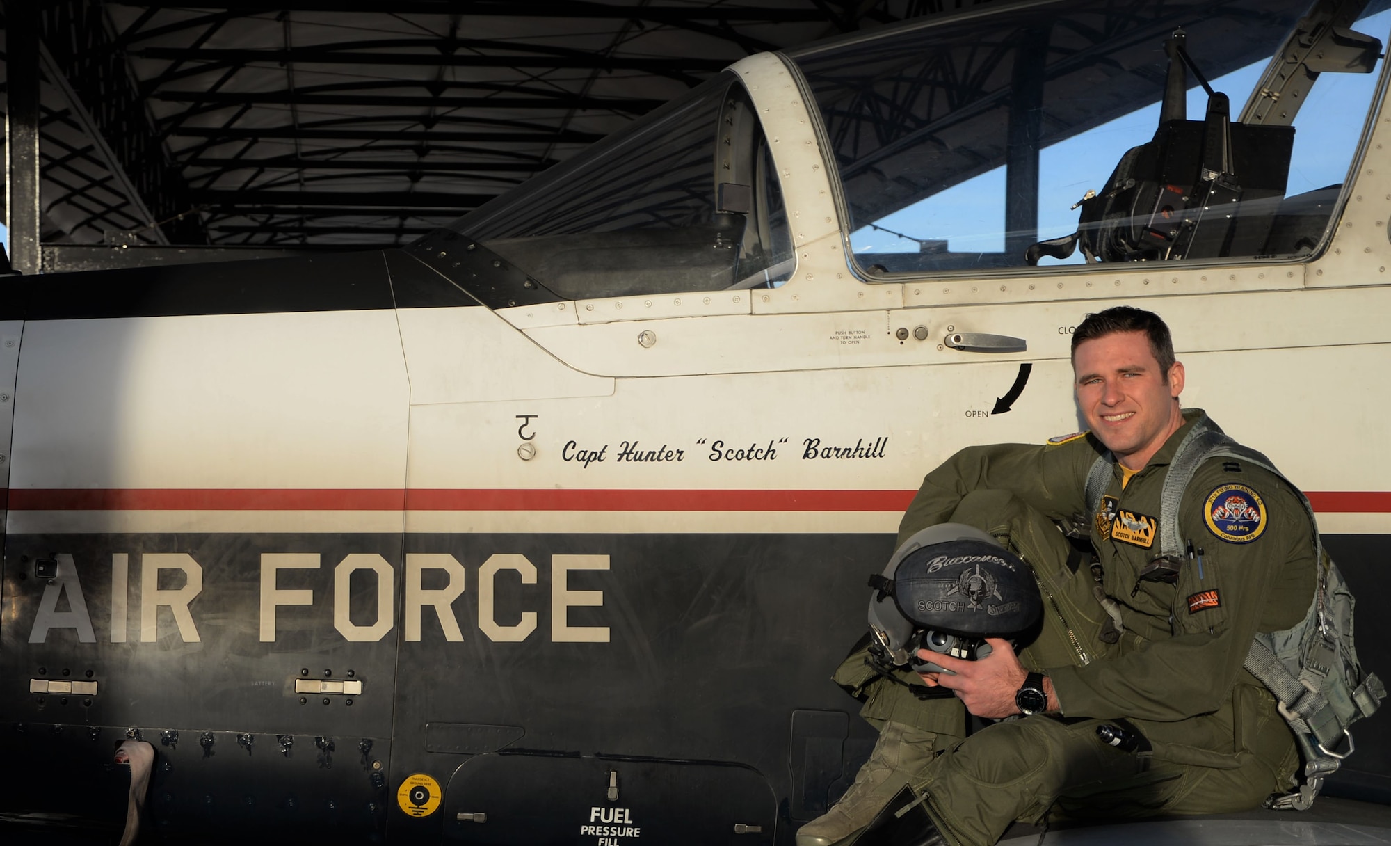 Capt. Hunter Barnhill, a 37th Flying Training Squadron instructor pilot, sits on the wing of his T-6A Texan II Jan. 26, 2018, on Columbus Air Force Base, Mississippi. Galatians 2:20 is one of the first verses, after his brain surgery, he had memorized and is a passage he attributes to his recovery going well. The spiritual pillar is a key component to an Airman’s resiliency and strength. (U.S. Air Force photo by Airman 1st Class Keith Holcomb)