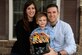 Capt. Hunter Barnhill, a 37th Flying Training Squadron instructor pilot, sits with his wife, Crystal, and their 3-year-old son, Nowlan, Jan 28, 2018, on Columbus Air Force Base, Mississippi. Many friends and families from Columbus AFB gave artwork and memorabilia from the 37th FTS to show their support for their family through his brain surgery and recovery process. (U.S. Air Force photo by Airman 1st Class Keith Holcomb)