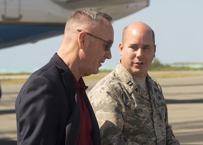 Marine Corps Gen. Joe Dunford, the chairman of the Joint Chiefs of Staff, speaks to an Air Force officer.