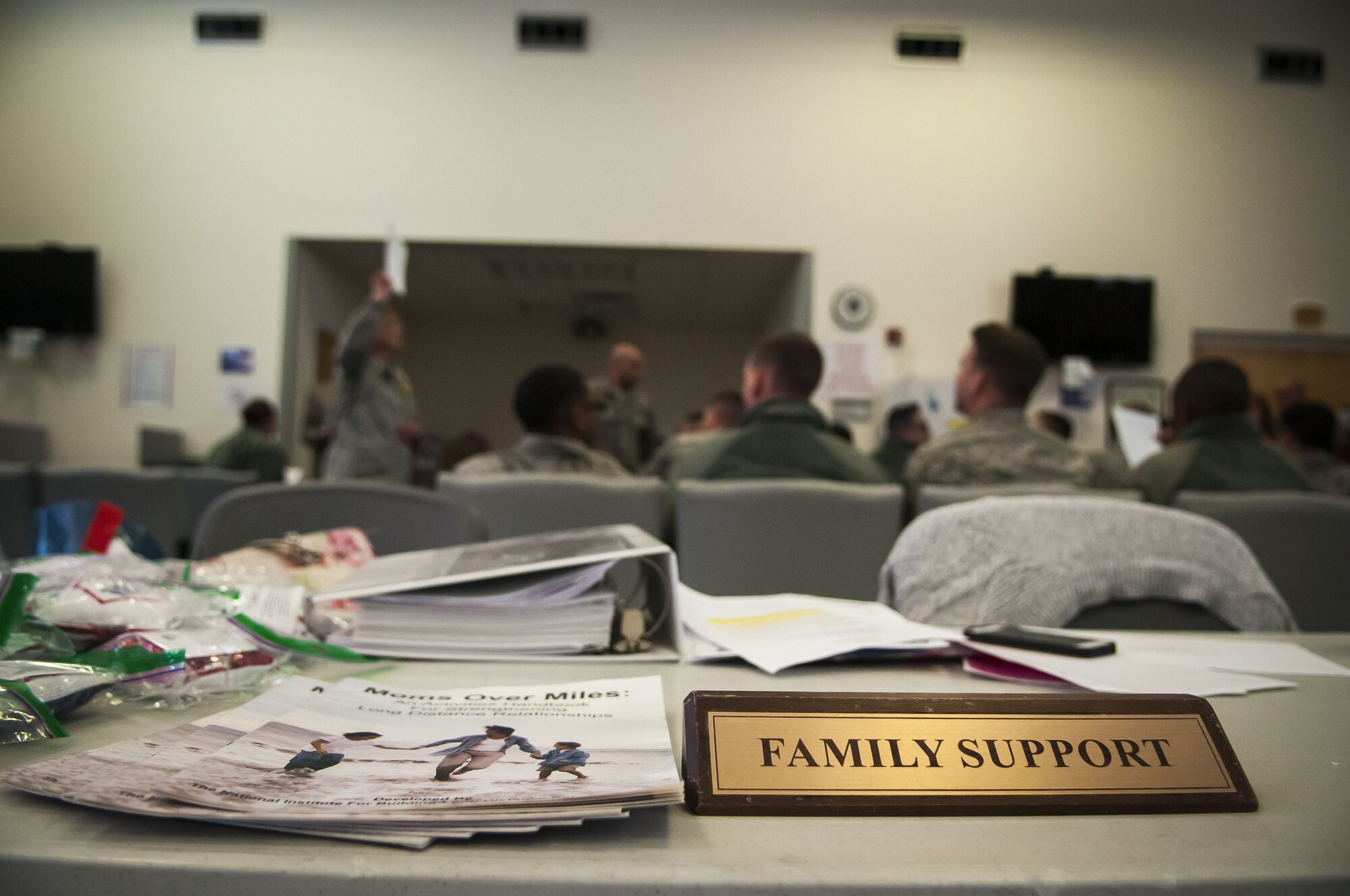 A group of Airmen from the 920th Security Forces Squadron listen to a briefing during a deployment line, days before heading overseas to an undisclosed location in Southeast Asia Jan. 6, 2018, at Patrick Air Force Base Florida.