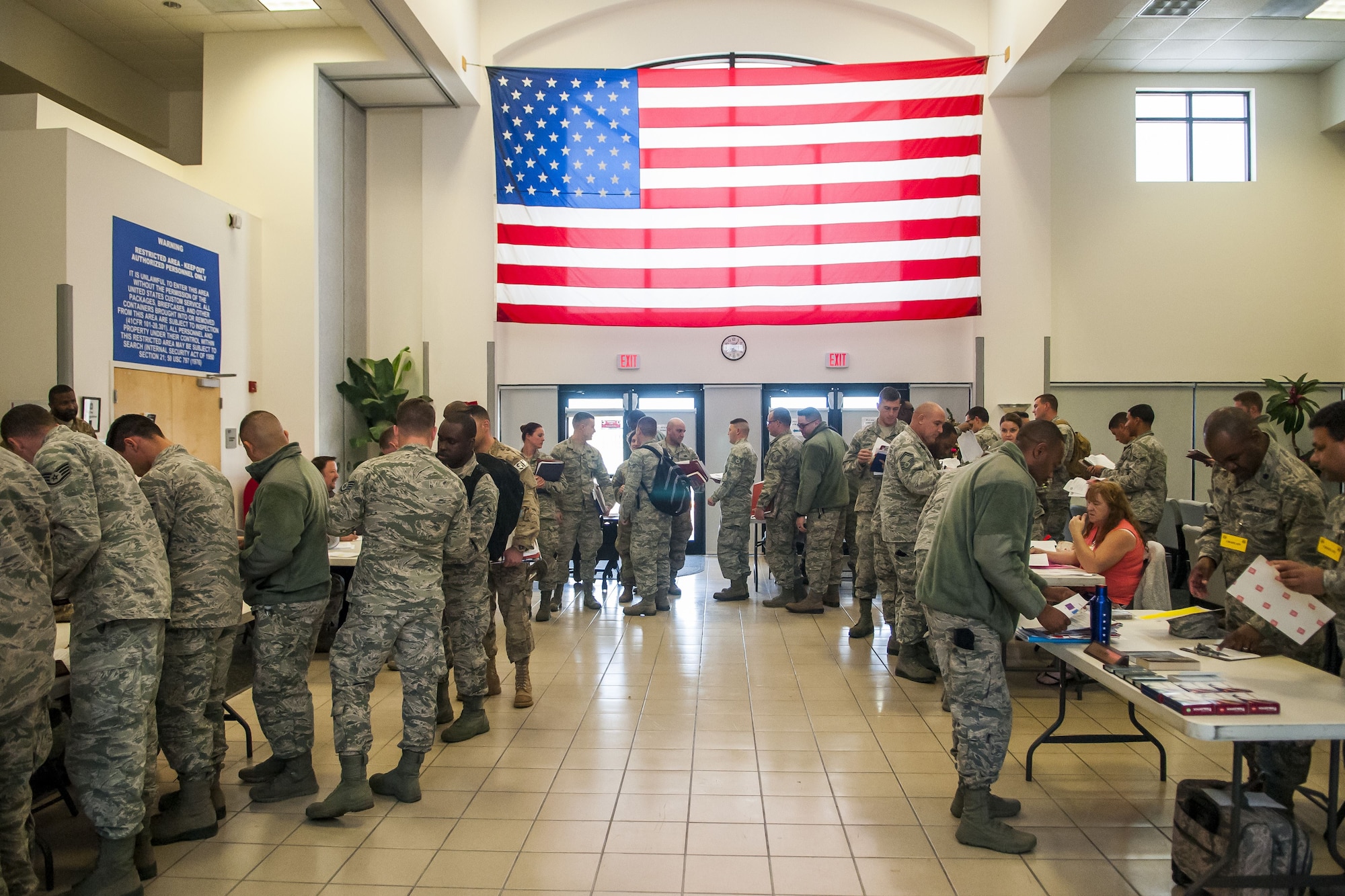 A group of Airmen from the 920th Security Forces Squadron go through a deployment line, days before heading overseas to an undisclosed location in Southeast Asia Jan. 6, 2018, at Patrick Air Force Base Florida.