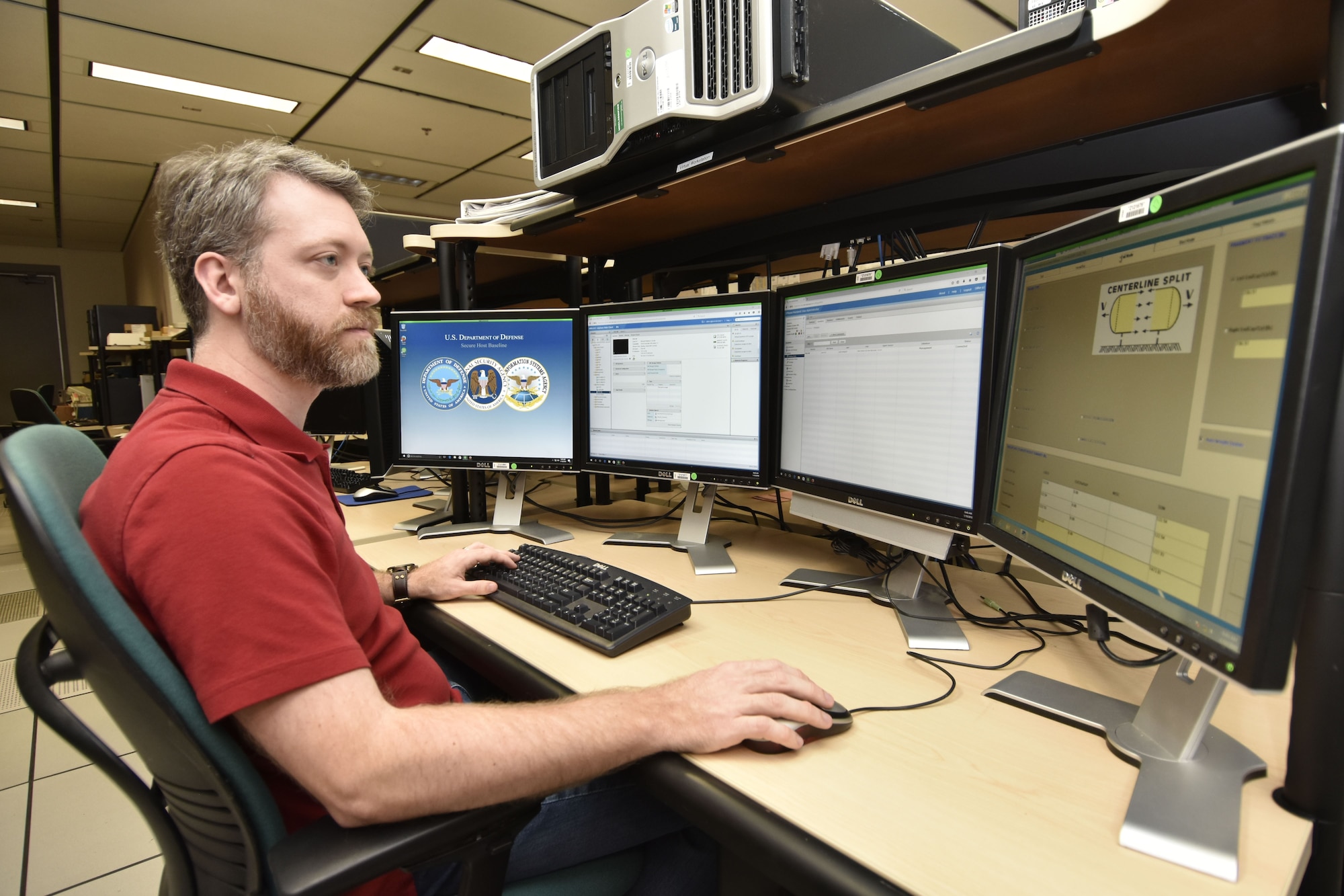 Joshua Diller, an AEDC system administrator at Arnold Air Force Base, works with an analysis software program for early engineering analyses related to pressure vessels. Diller, with the help of other AEDC team members, was able to install the software, which is more than 20 years old, and make it useable on the current system. (U.S. Air Force photo/Rick Goodfriend)