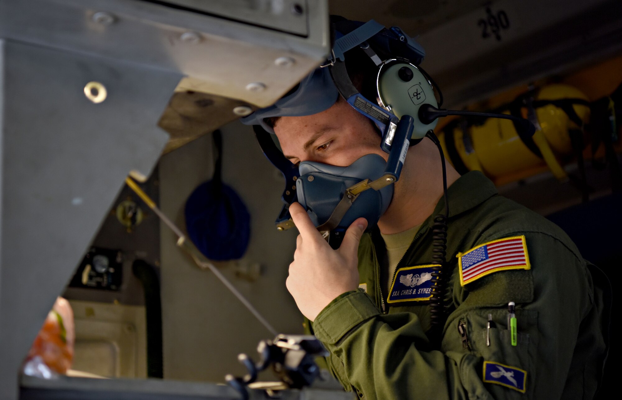U.S. Air Force Senior Airman Chris Symes, 14th Airlift Squadron loadmaster, checks an oxygen mask before takeoff at Joint Base Charleston, S.C. Jan. 30, 2018.