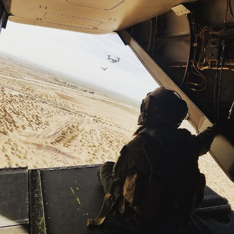 U.S. Marine Corps Cpl. Karissa Tanguay-Jones, a native of Colorado Springs, Colorado, sits in the back of an MV-22 Osprey during a recent training flight in California. Tanguay-Jones stars in "A Nation's Call," the latest advertisement released under the Marine Corps' “Battles Won” strategy. The commercial unfolds by showcasing the full power of the United States Marine Corps engaged in an assault mission. Depicting a 5th Generation Marine Corps operation (naval integration, ship-to-objective, technology-fueled). As the Marines move toward the objective, each layer of ships, tanks, armored vehicles, planes and helicopters is removed. This visual story, in combination with the voiceover, will communicate and emphasize to the audience that, when the Nation faces any battle, the Marines themselves—with their fighting spirit—are the greatest weapon in the United States Marine Corps’ arsenal.