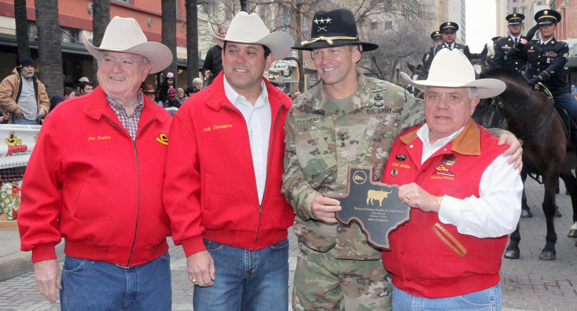 The parade organizers presented Lt. Gen. Jeffrey S. Buchanan, U.S. Army North (Fifth Army) commanding general, with a plaque honoring the Fort Sam Houston Caisson Section.