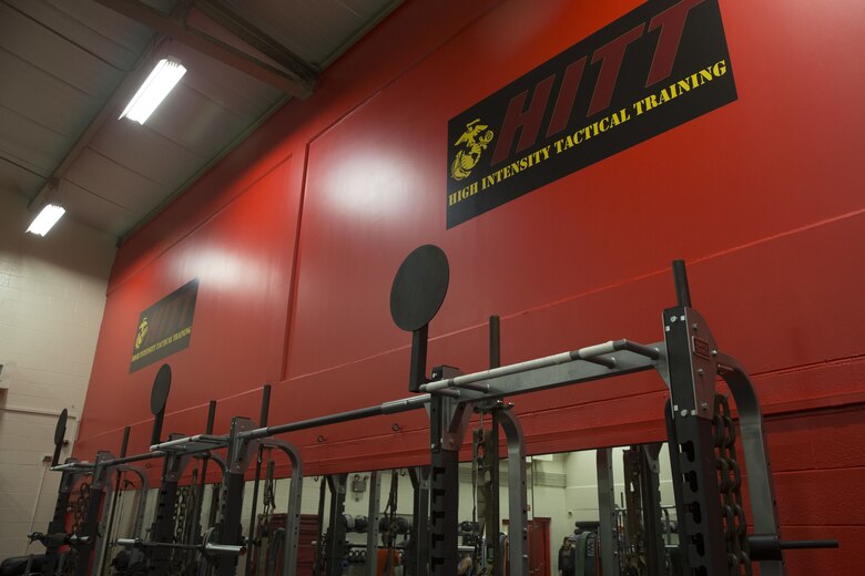A High-Intensity Tactical Training (HITT) logo is advertised on the wall of the newly remodeled Semper Fit HITT Center, aboard Marine Corps Base Hawaii, Feb. 2, 2018. The newly remodeled HITT Center and Fitness Center feature new equipment, flooring, and infrastructure designed to ensure that Marines aboard the installation can produce readiness by being able to better ready themselves for the challenges of the modern warfighter. (U.S. Marine Corps photo by Sgt. Alex Kouns)