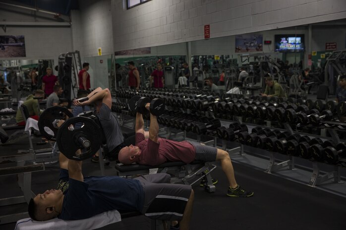 U.S. Marines, Sailors, civilian Marines, and base personnel aboard Marine Corps Base Hawaii, exercise in the newly remodeled Semper Fit Fitness Center, Feb. 2, 2018. The newly remodeled fitness center features new equipment designed to ensure that Marines aboard the installation can produce readiness by being able to better ready themselves for the challenges of the modern warfighter. (U.S. Marine Corps photo by Sgt. Alex Kouns)