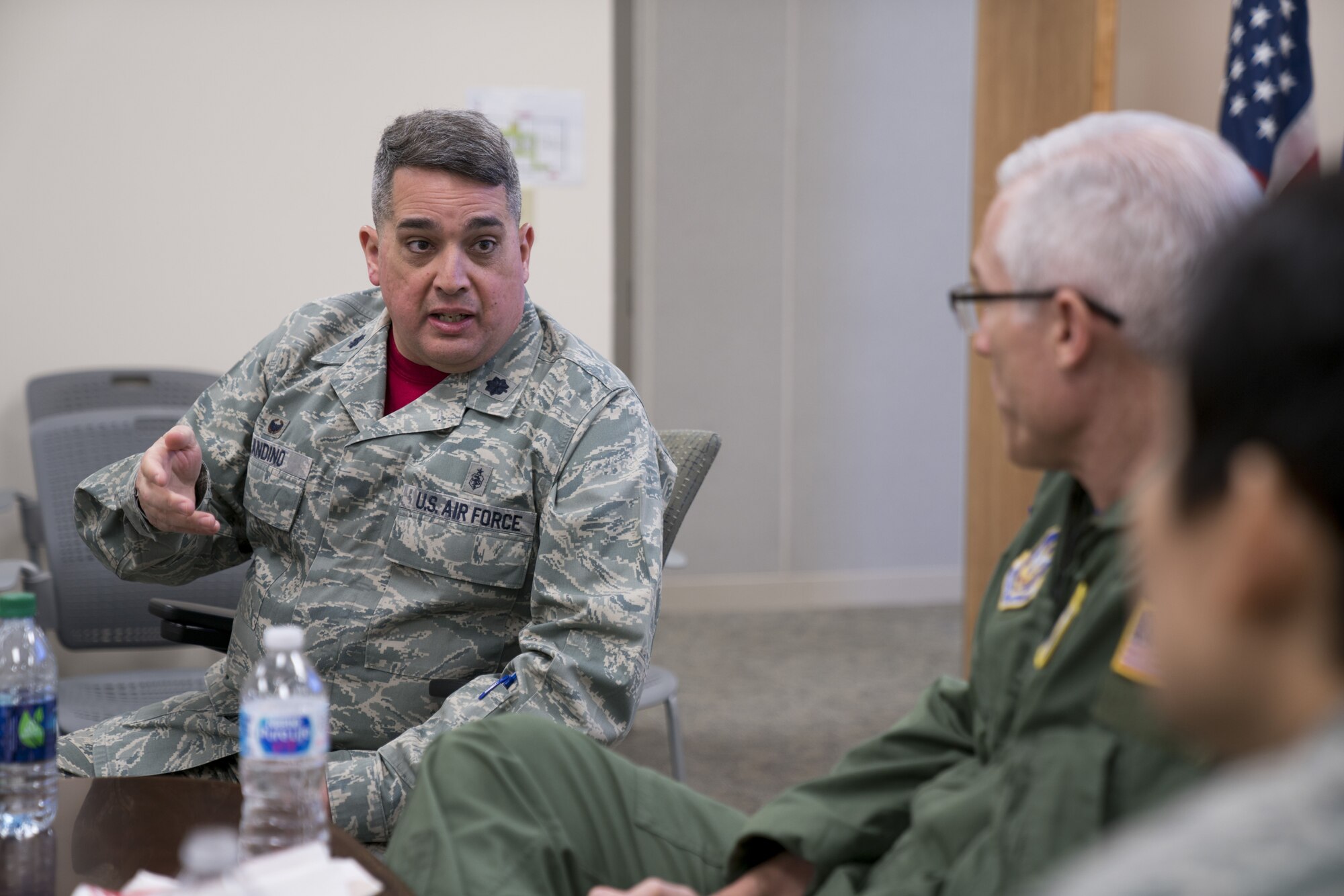 Lt. Col. Rafael Andino, 413th Aeromedical Staging Squadron commander, speaks to Maj. Gen. Craig La Fave, 22nd Air Force commander, and Chief Master Sgt. Imelda Johnson, 22nd AF command chief, Feb. 2, 2018, at Robins Air Force Base, Georgia. La Fave and Johnson had lunch with members of the unit and gave them opportunities to ask questions and discuss concerns. (U.S. Air Force photo by Jamal D. Sutter)