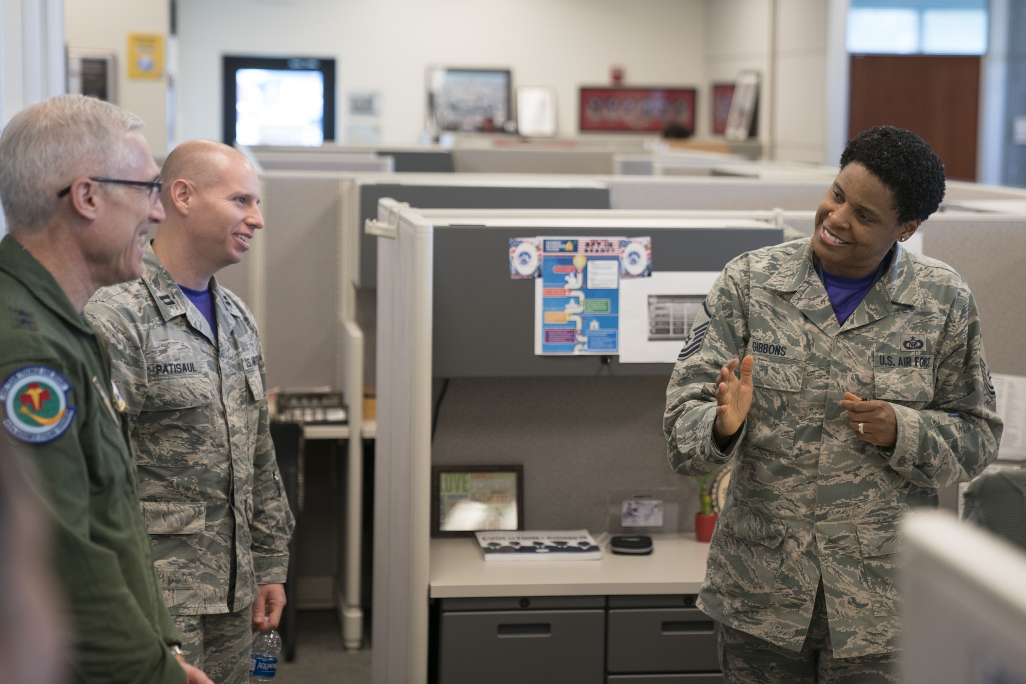 Master Sgt. Aridth Gibbons, 413th Force Support Flight readiness NCO, speaks with Maj. Gen. Craig La Fave, 22nd Air Force commander, Feb. 2, 2018, at Robins Air Force Base, Georgia. This was La Fave's first visit to the unit since taking his new position in November of 2017. (U.S. Air Force photo by Jamal D. Sutter)